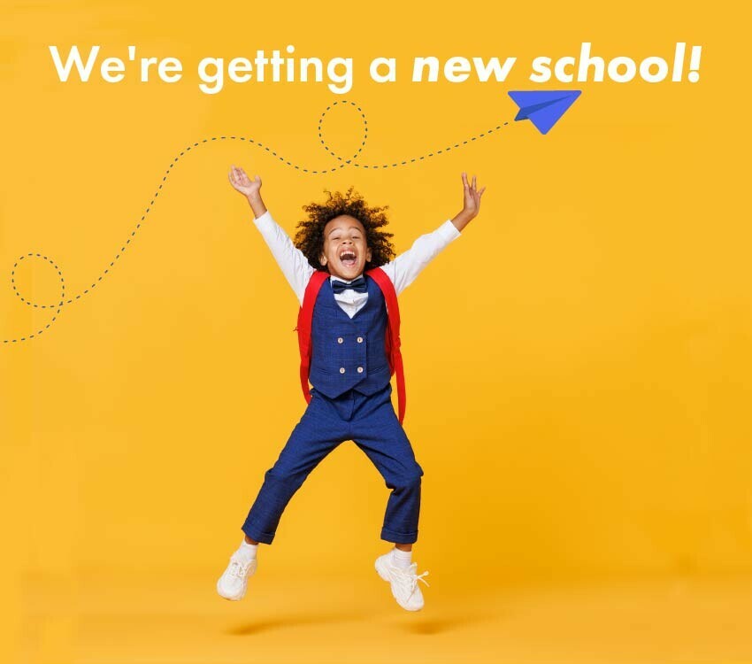 Young child jumping up in celebration
